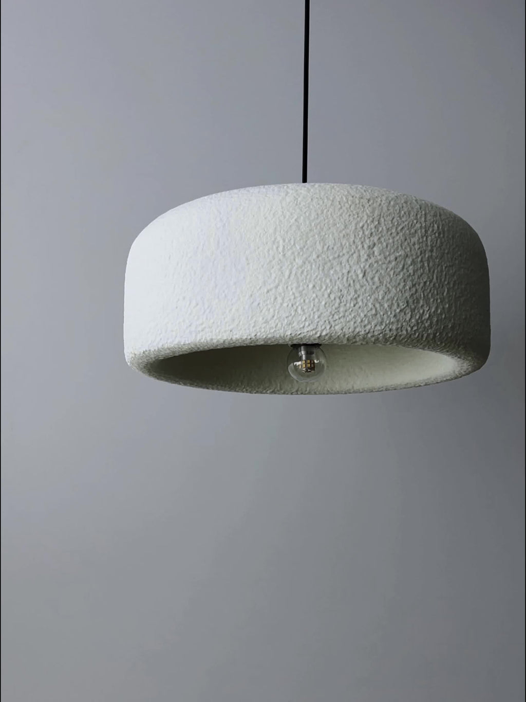 Large Stone-Textured Lampshades Are Artistically Suspended in a Spacious Exhibition Hall. The Ultra-Lightweight, High-Quality Cream-White Italian-Style Lampshade Additions Are Perfect for Creative Studios, Italian Villas, Entryways, Corridors